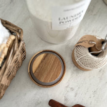 Load image into Gallery viewer, Wooden lid on a marble surface with a jar and other items.