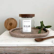 Load image into Gallery viewer, Minimalist small glass jar with acacia lid, with a white waterproof label styled with a wooden spoon and greenery in a modern kitchen setting.